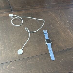 Sleek Blue Smartwatch with Charger